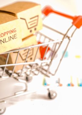 Online shopping, Shopping cart box on business graph, import export, finance commerce.